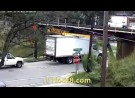 Another reefer truck stuck under the 11foot8 bridge