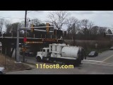 Industrial vacuum truck smashes into the 11foot8 bridge