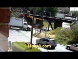 Boxtruck gets peeled open and stuck at the 11foot8 bridge