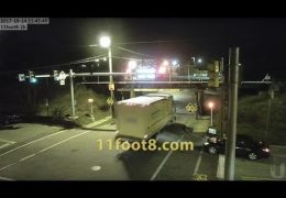 Truck runs light and rips off roof at the 11foot8 bridge