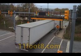 Semi truck gets fairing stuck at the 11foot8+8 bridge