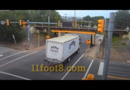 Boxtruck crash sprays debris at the 11foot8+8 bridge