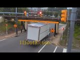 Reefer truck gets stuck under the 11foot8+8 bridge