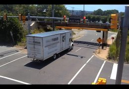 Moving truck runs red light and scrapes the 11foot8+8 bridge