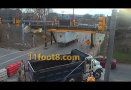 Truck turns left and hits the 11foot8+8 bridge
